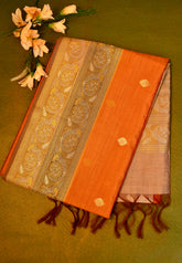 Soft silk  saree in orange with Gold Zari Border